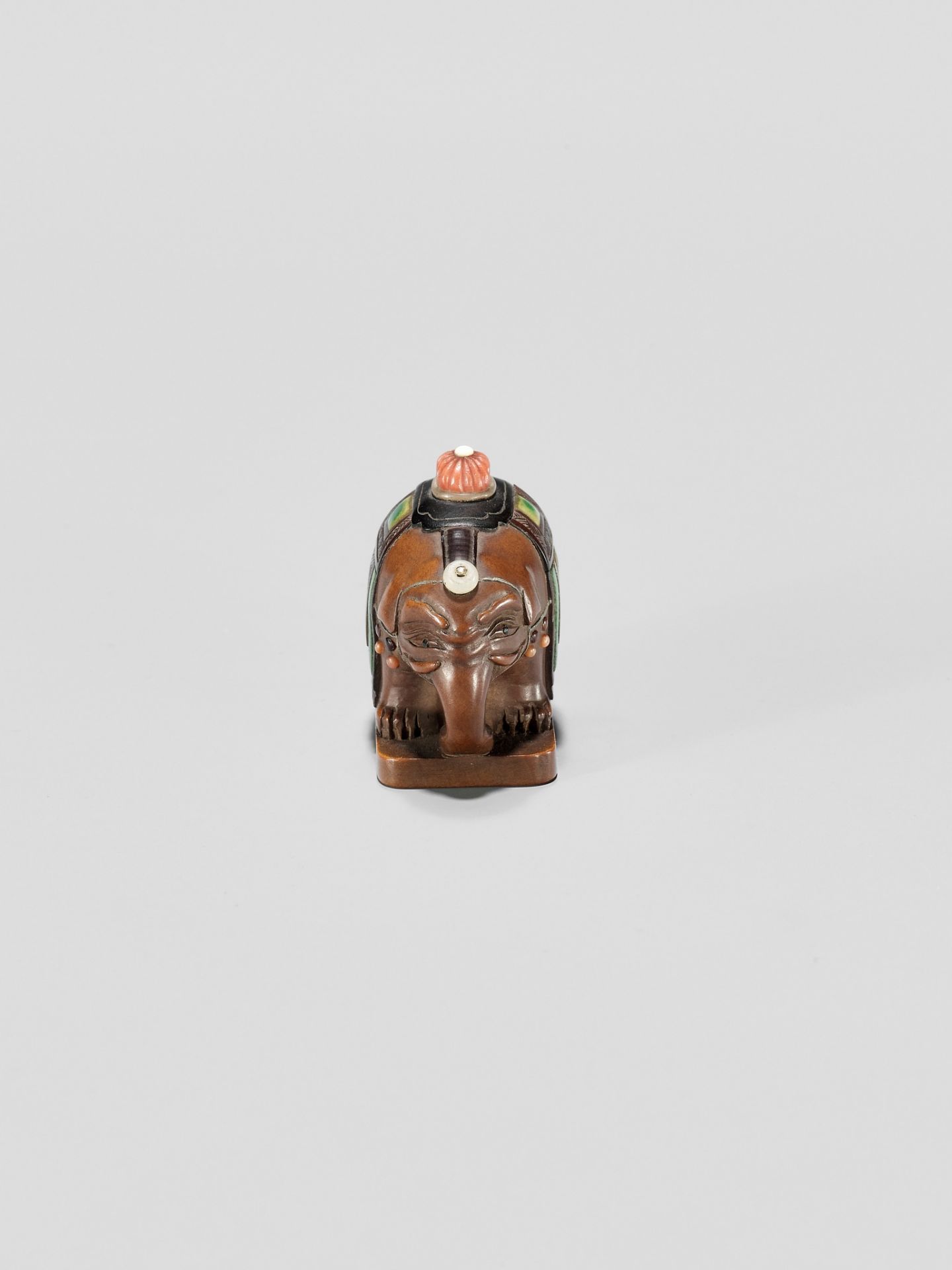 DOSHO: A SHIBAYAMA-INLAID WOOD NETSUKE OF A CAPARISONED ELEPHANT - Image 7 of 10