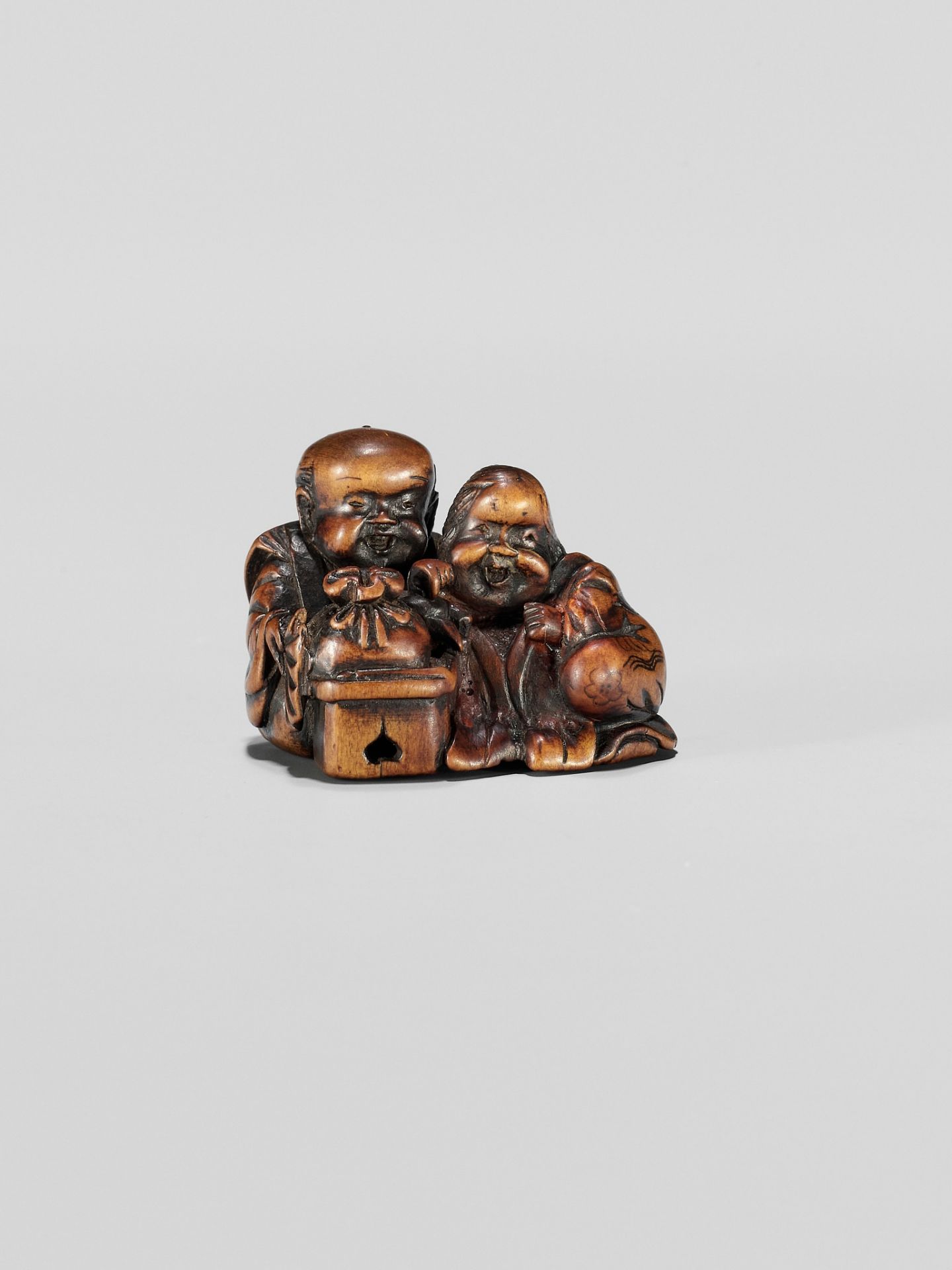 HIDESADA: A FINE WOOD NETSUKE OF OKAME AND FUKUSUKE - Image 8 of 12