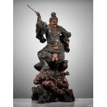 A LARGE AND IMPRESSIVE LACQUERED WOOD FIGURE OF THE HEAVENLY KING ZOCHOTEN