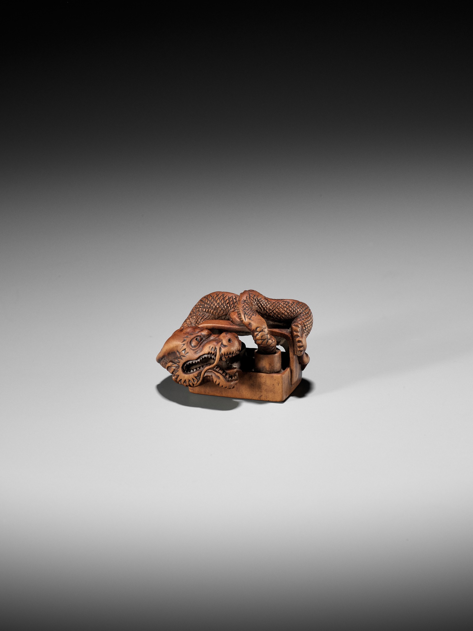 A WOOD NETSUKE OF A DRAGON EMERGING FROM AN ASH POT (HAIFUKI KARA RYU) - Image 2 of 12