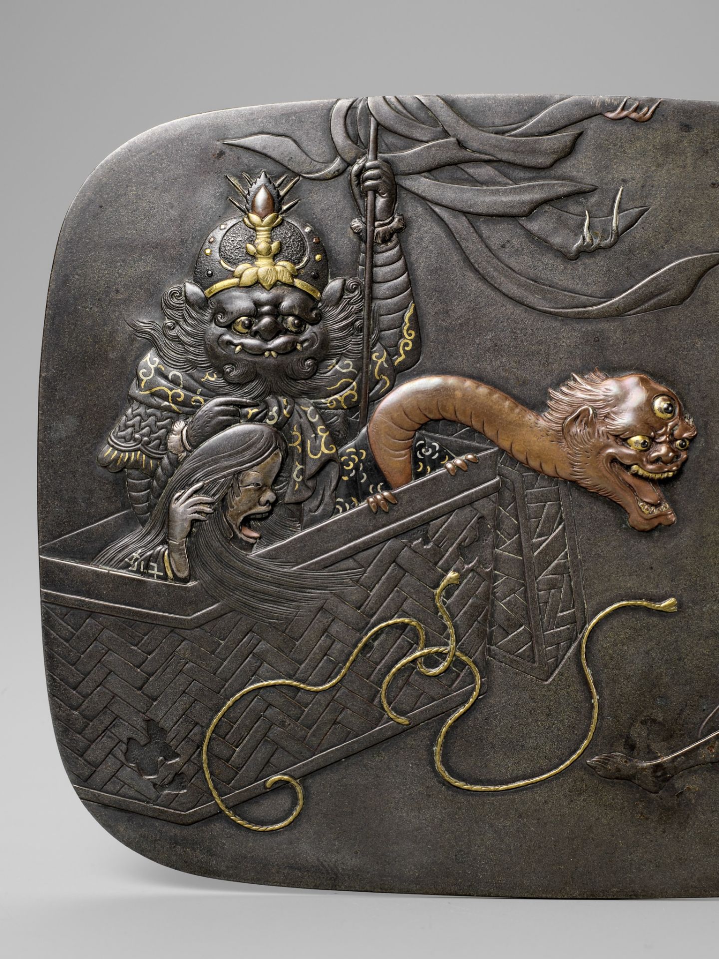 KATSUHIRO: A SUPERB MIXED METAL PLAQUE DEPICTING ARABABA AND THE YOKAI BOX