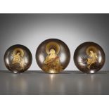 KAJIKAWA: A SUPERB SET OF THREE LACQUER SAKE SAUCERS DEPICTING BUDDHA, MONJU AND FUGEN BOSATSU