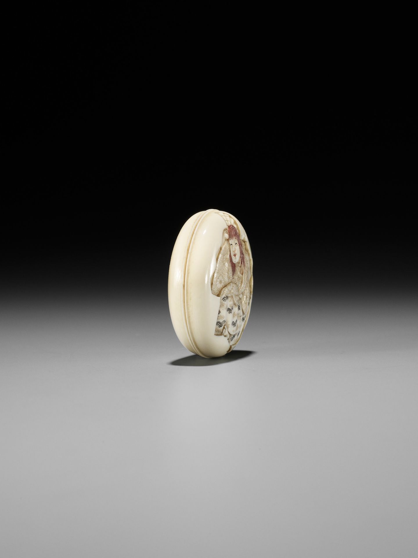 IKKOSAI: AN IVORY MANJU NETSUKE OF A DRUNKEN SHOJO - Image 6 of 9