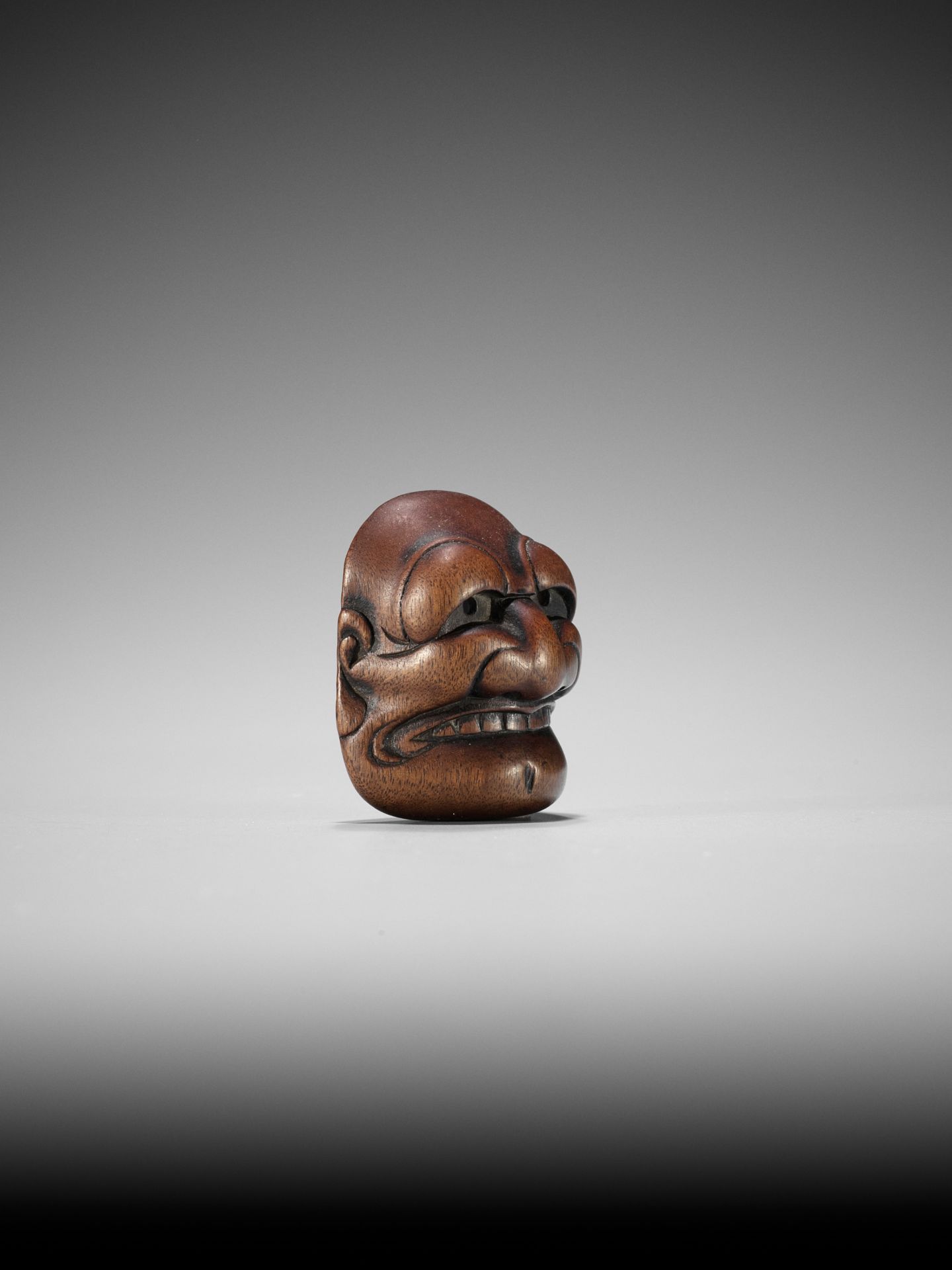 TADATOSHI: A FINE NAGOYA SCHOOL WOOD MASK NETSUKE OF BUAKU - Bild 7 aus 11