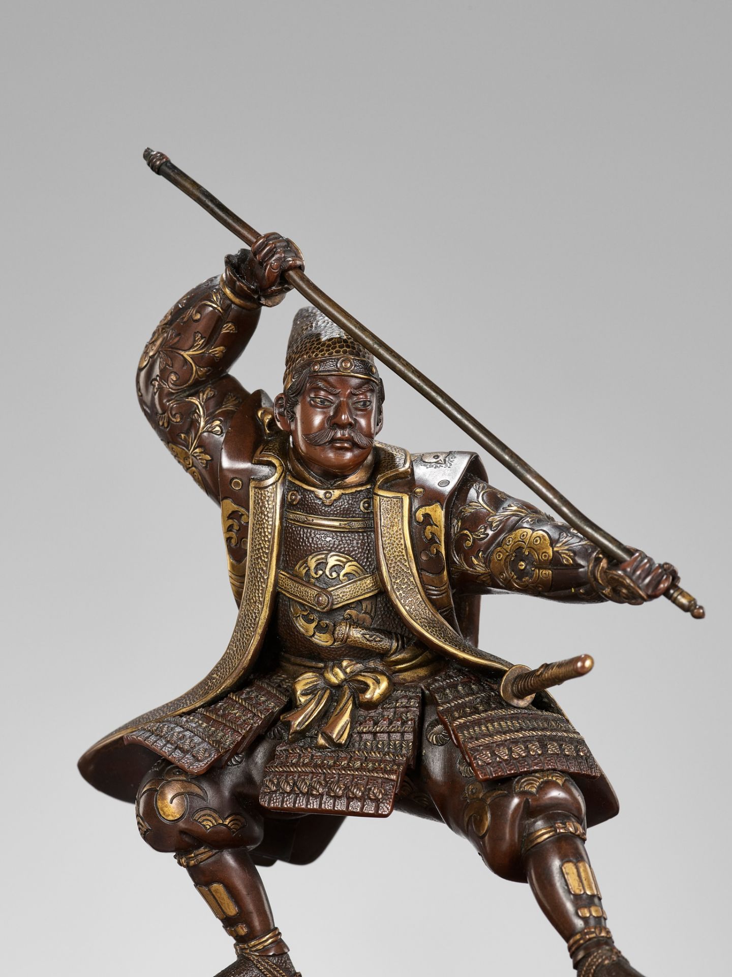 MIYAO: A PARCEL-GILT BRONZE FIGURE OF A WARRIOR