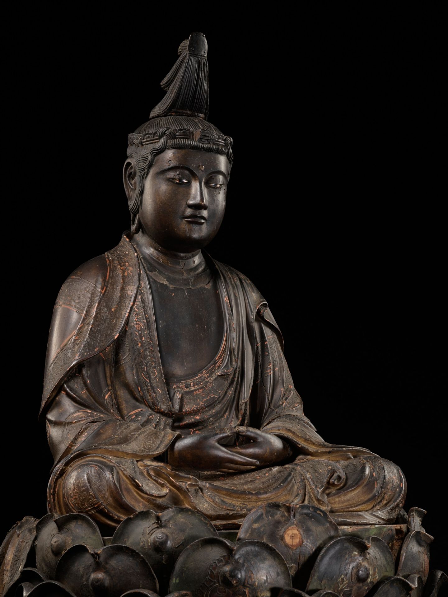 A VERY LARGE AND RARE LACQUERED WOOD FIGURE OF HOKAN SHAKA NYORAI, MUROMACHI PERIOD