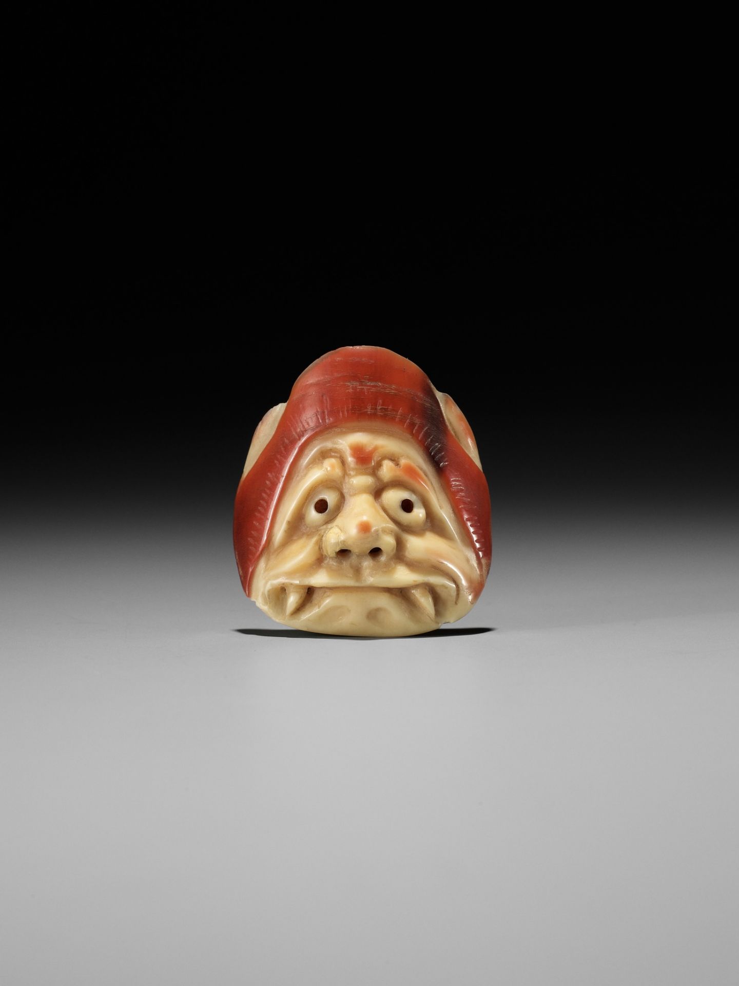 A RARE HONEN (HORNBILL) MASK NETSUKE OF AN ONI, ATTRIBUTED TO JUGYOKU - Image 7 of 9