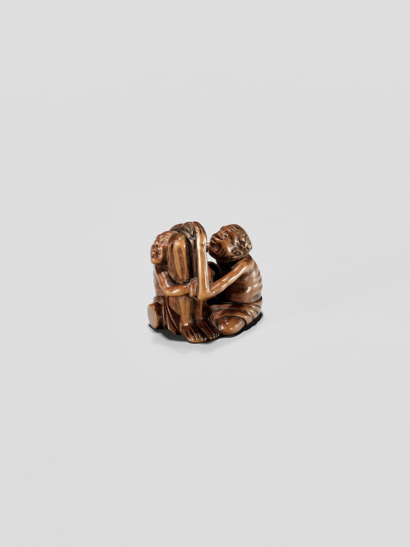 A TOMOCHIKA SCHOOL WOOD NETSUKE OF ASHINAGA AND TENAGA - Image 9 of 10