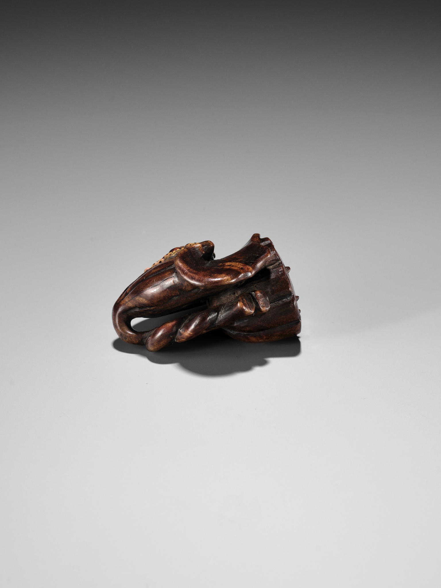 IKKOKUSAI: A RARE TAKAMORIE LACQUERED WOOD NETSUKE OF A WASP AND LOTUS - Image 7 of 7