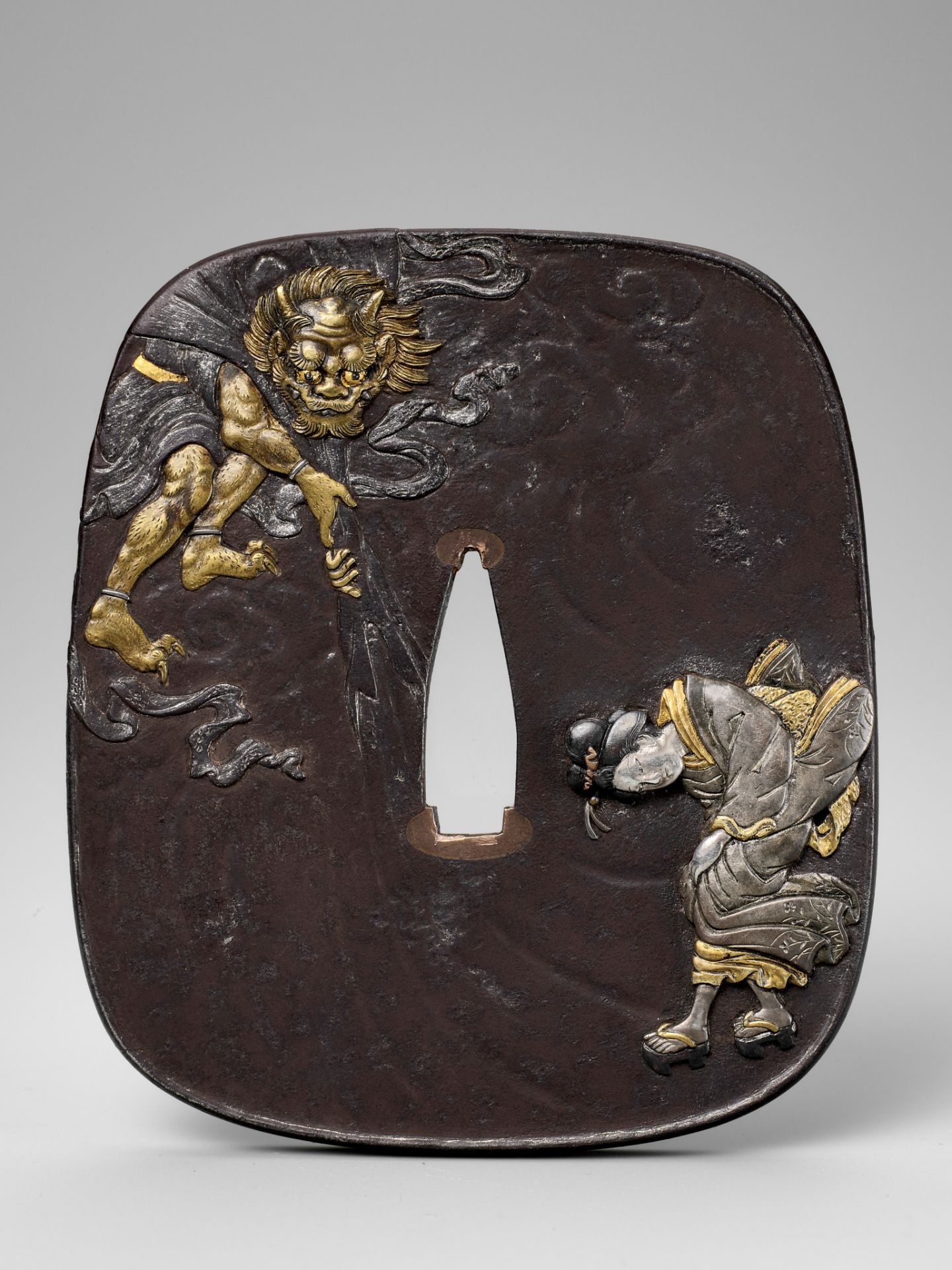 HAGIYA KATSUHIRA: A FINE IRON TSUBA WITH FUJIN AND GEISHA