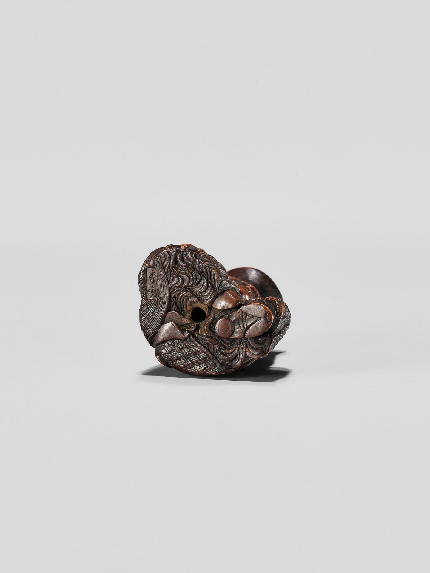 HIDEHARU: A NAGOYA SCHOOL WOOD NETSUKE OF A DRUNKEN SHOJO WITH LADLE AND SAKE SAUCER - Image 10 of 11