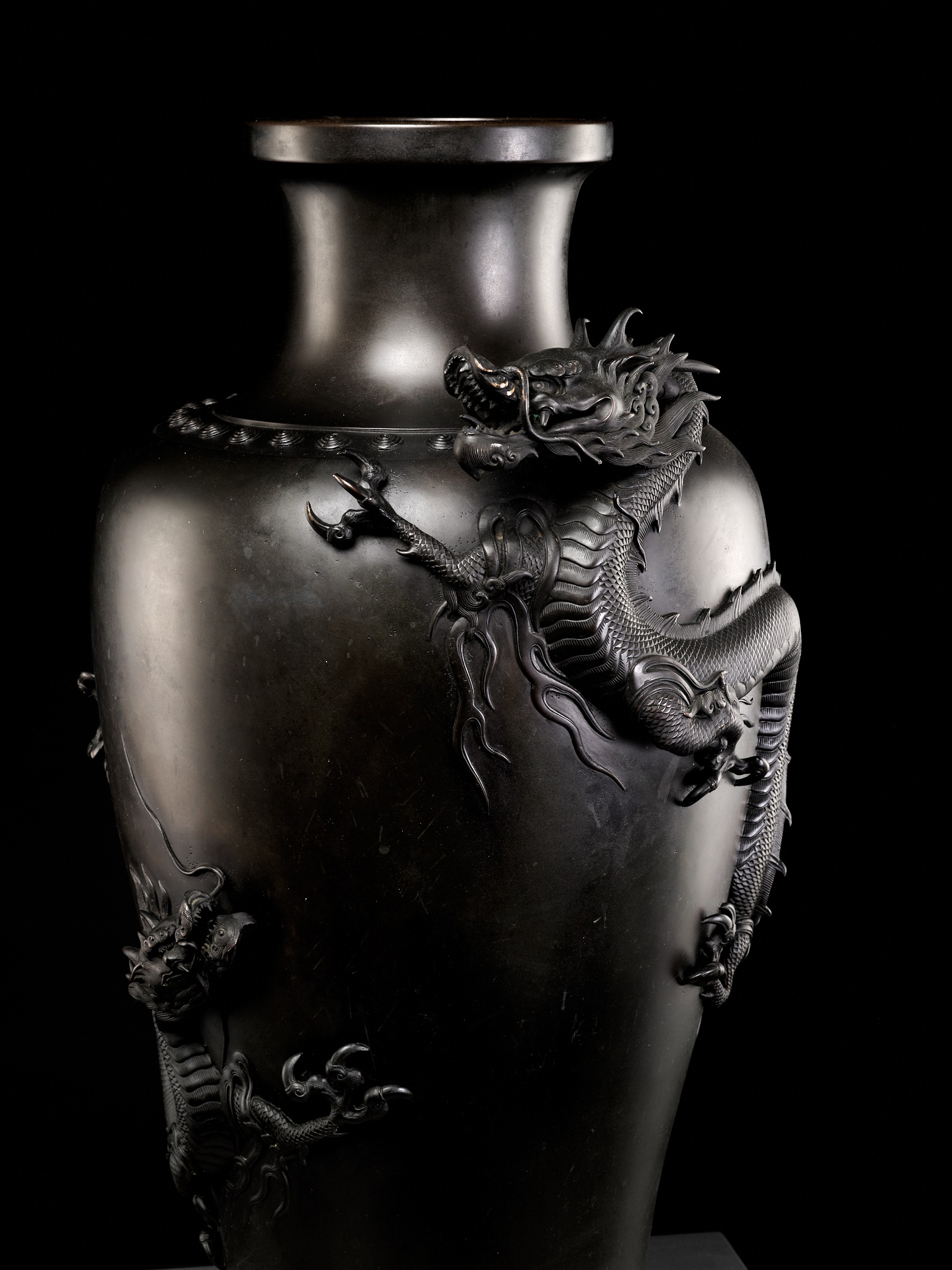 A MASSIVE BRONZE VASE WITH DRAGONS