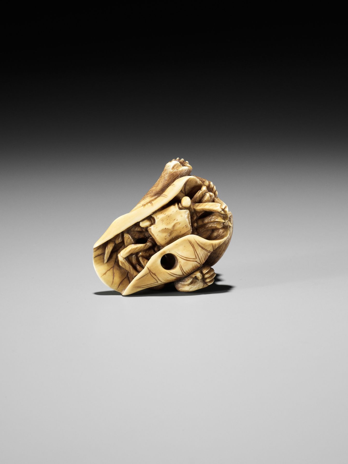 AN IVORY NETSUKE OF A MONKEY, CRAB AND LOTUS - Image 2 of 10
