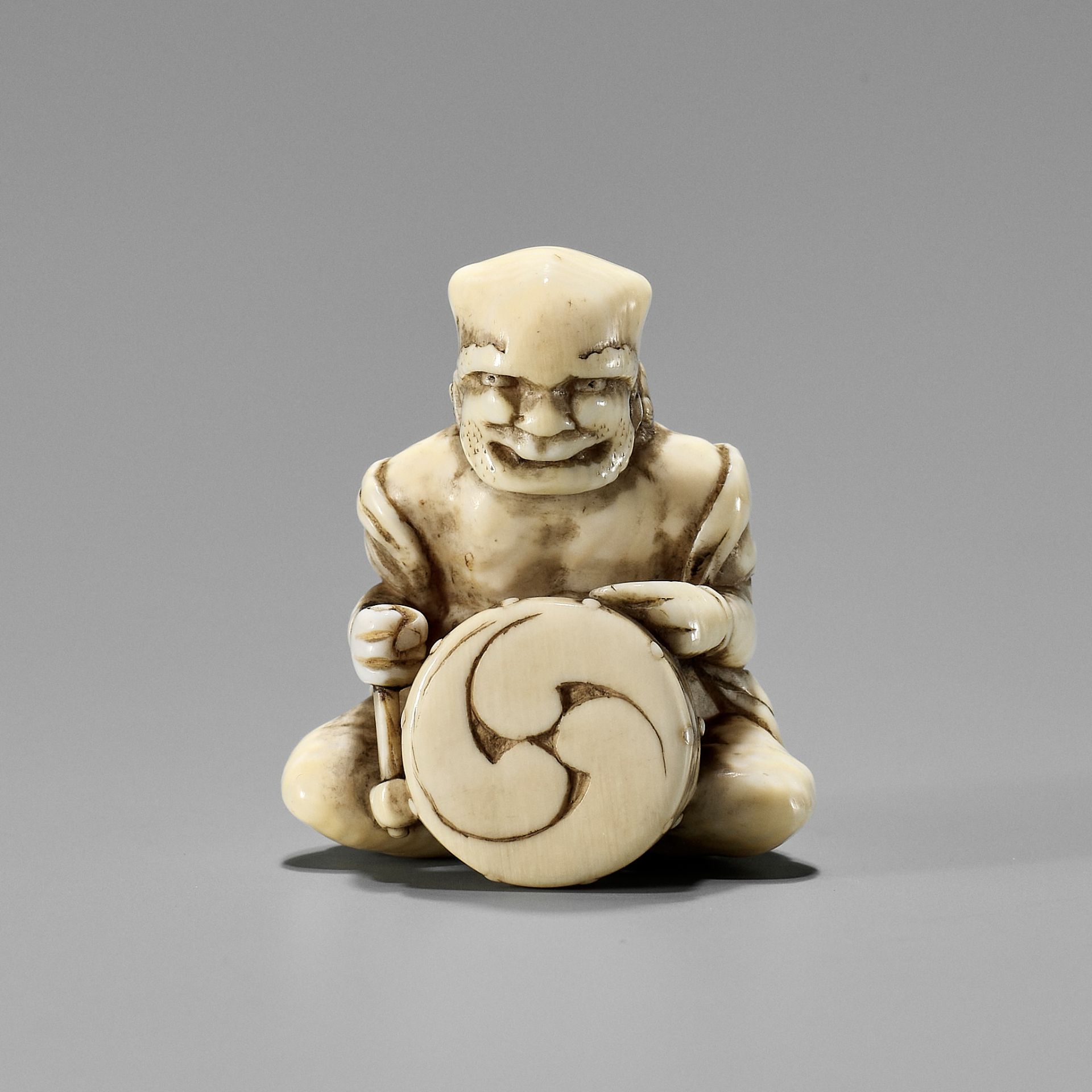 GYOKKOSAI: A FINE IVORY NETSUKE OF RAIJIN