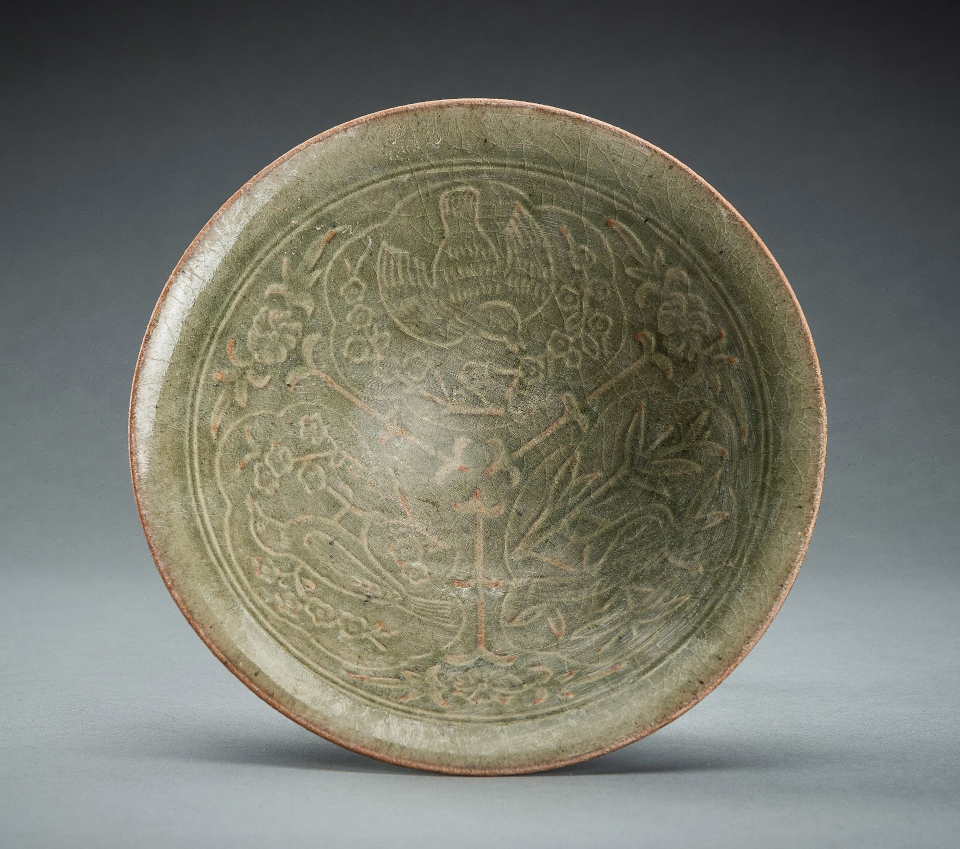 A LONGQUAN CELADON 'BIRDS' BOWL, NORTHERN SONG STYLE