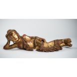 A BURMESE GILT-LACQUERED WOOD FIGURE OF THE RECLINING BUDDHA