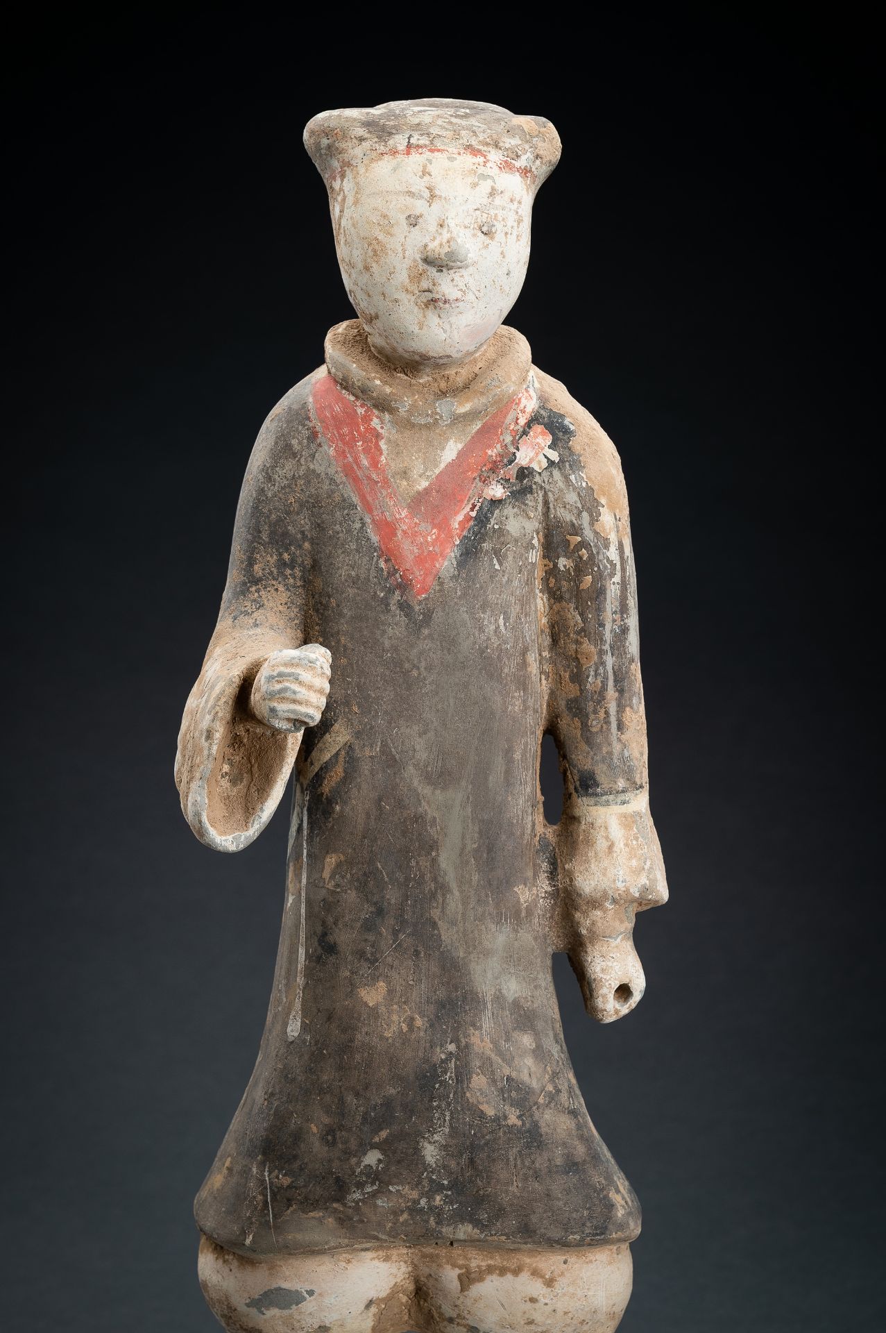 A POTTERY FIGURE OF A GUARD, HAN DYNASTY