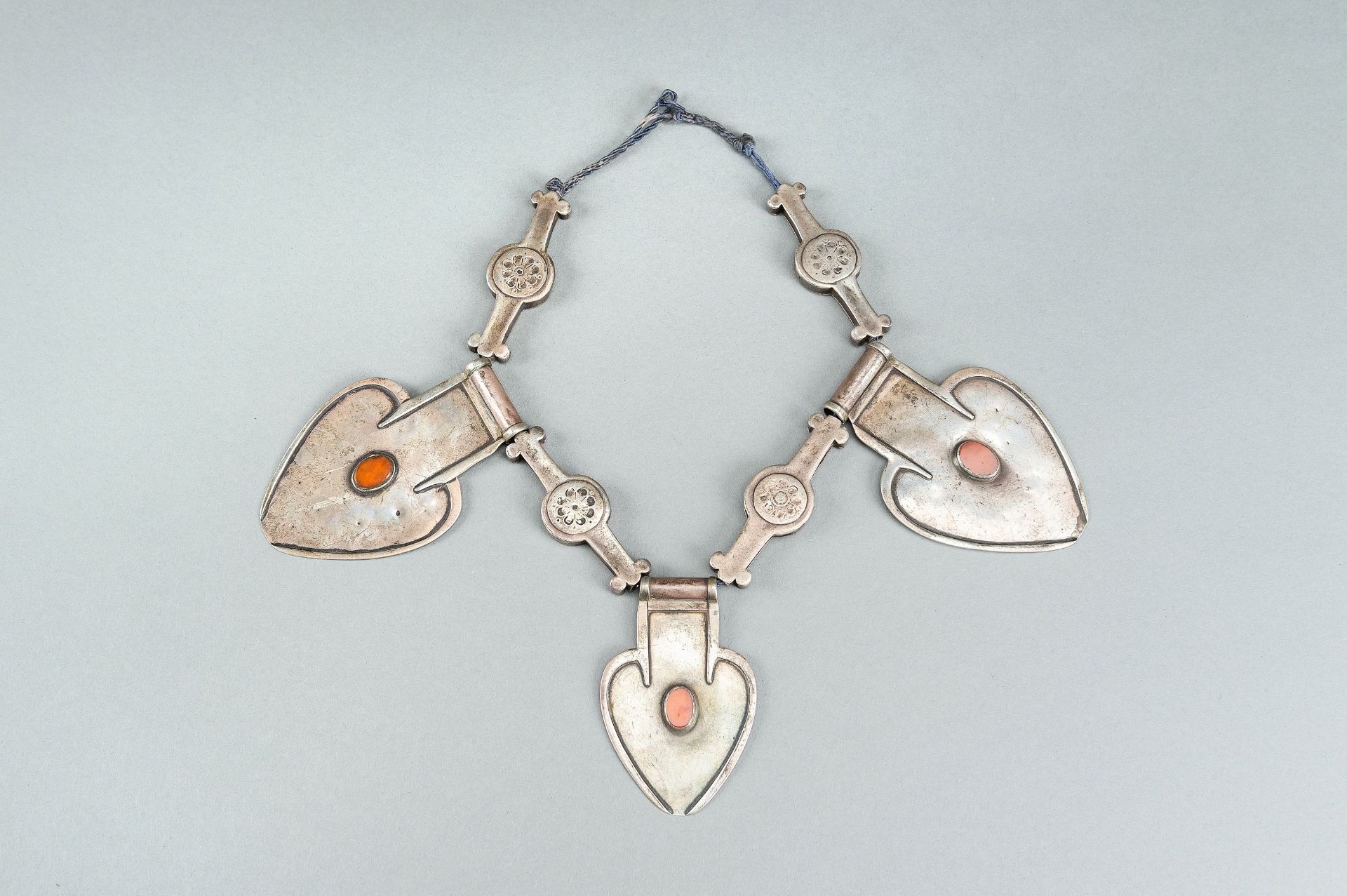 A TURKOMAN SILVER AND CARNELIAN ASYK PENDANT, c. 1900s