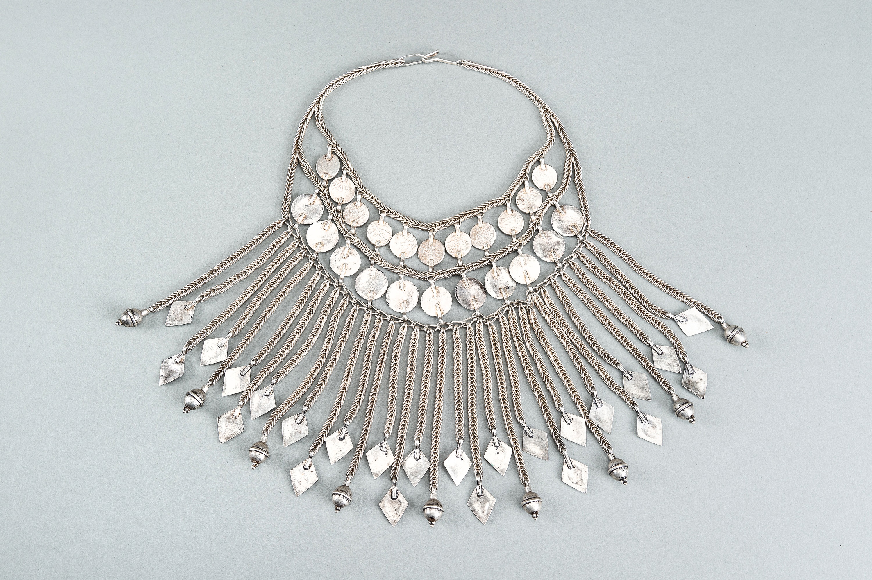 A TRIBAL AFGHAN MULTI-STRAND SILVER NECKLACE WITH GLASS INSETS, c. 1950s - Image 13 of 13