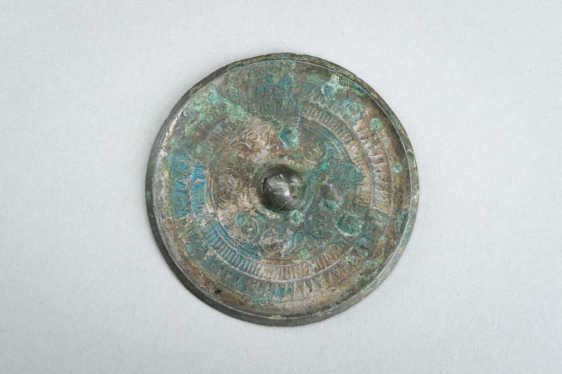 A BRONZE MIRROR, HAN DYNASTY