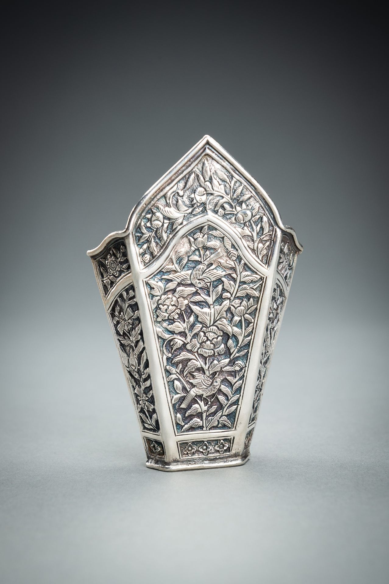 A GROUP OF FIVE EMBOSSED SILVER BETEL LEAF HOLDERS, c. 1900s - Image 13 of 19