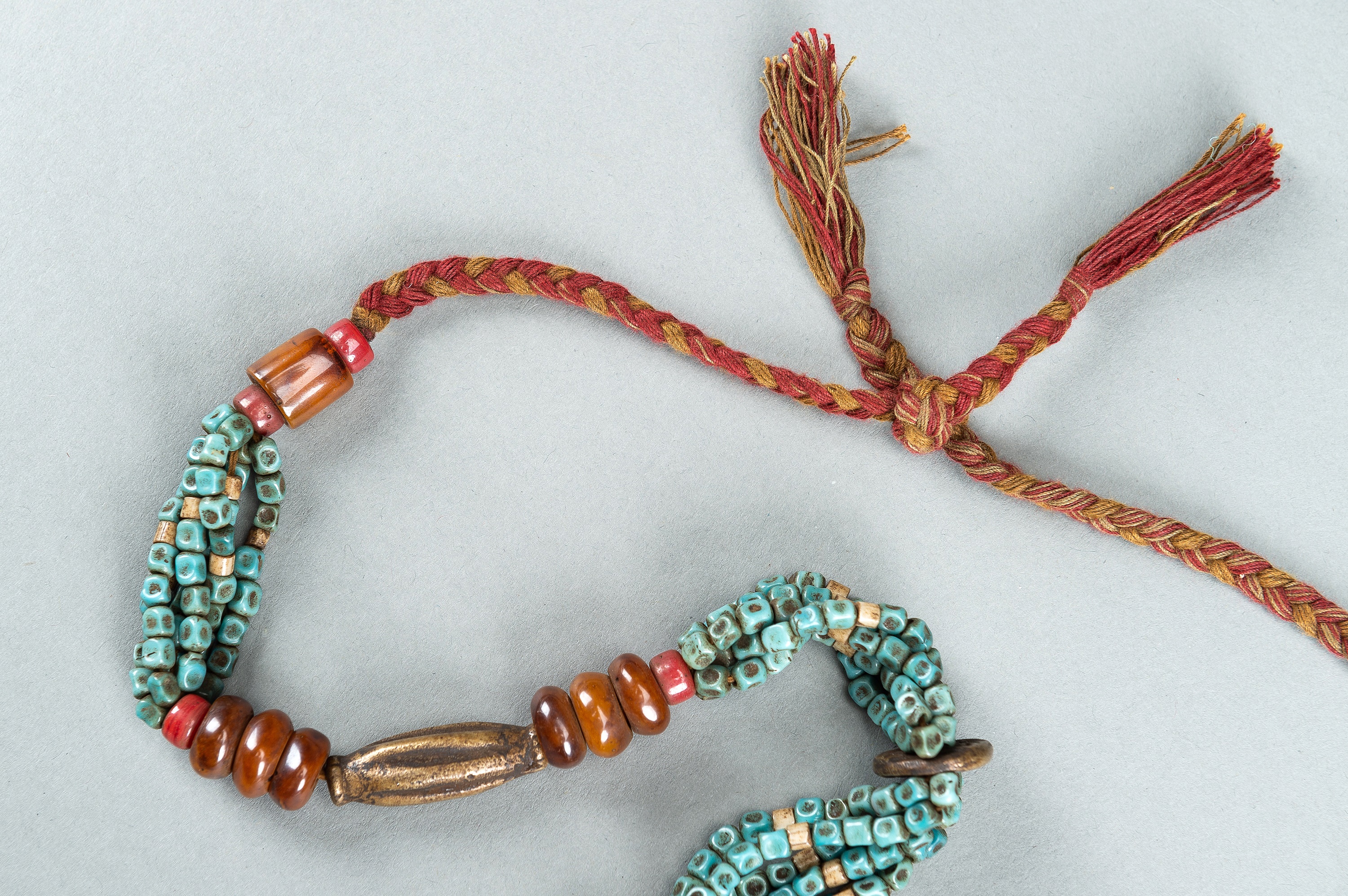 A NAGALAND MULTI-COLORED GLASS, BRASS AND SHELL NECKLACE, c. 1900s - Image 7 of 9