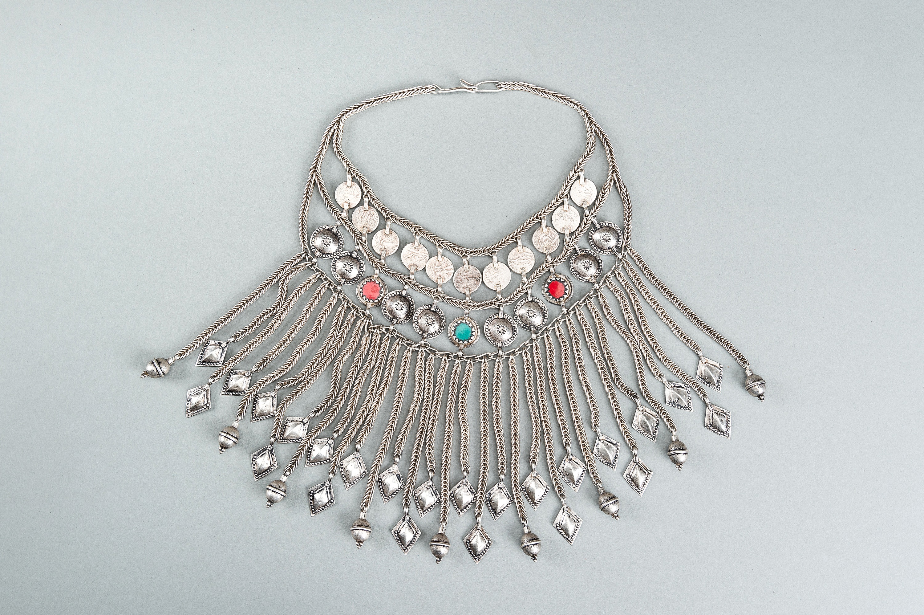A TRIBAL AFGHAN MULTI-STRAND SILVER NECKLACE WITH GLASS INSETS, c. 1950s - Image 2 of 13