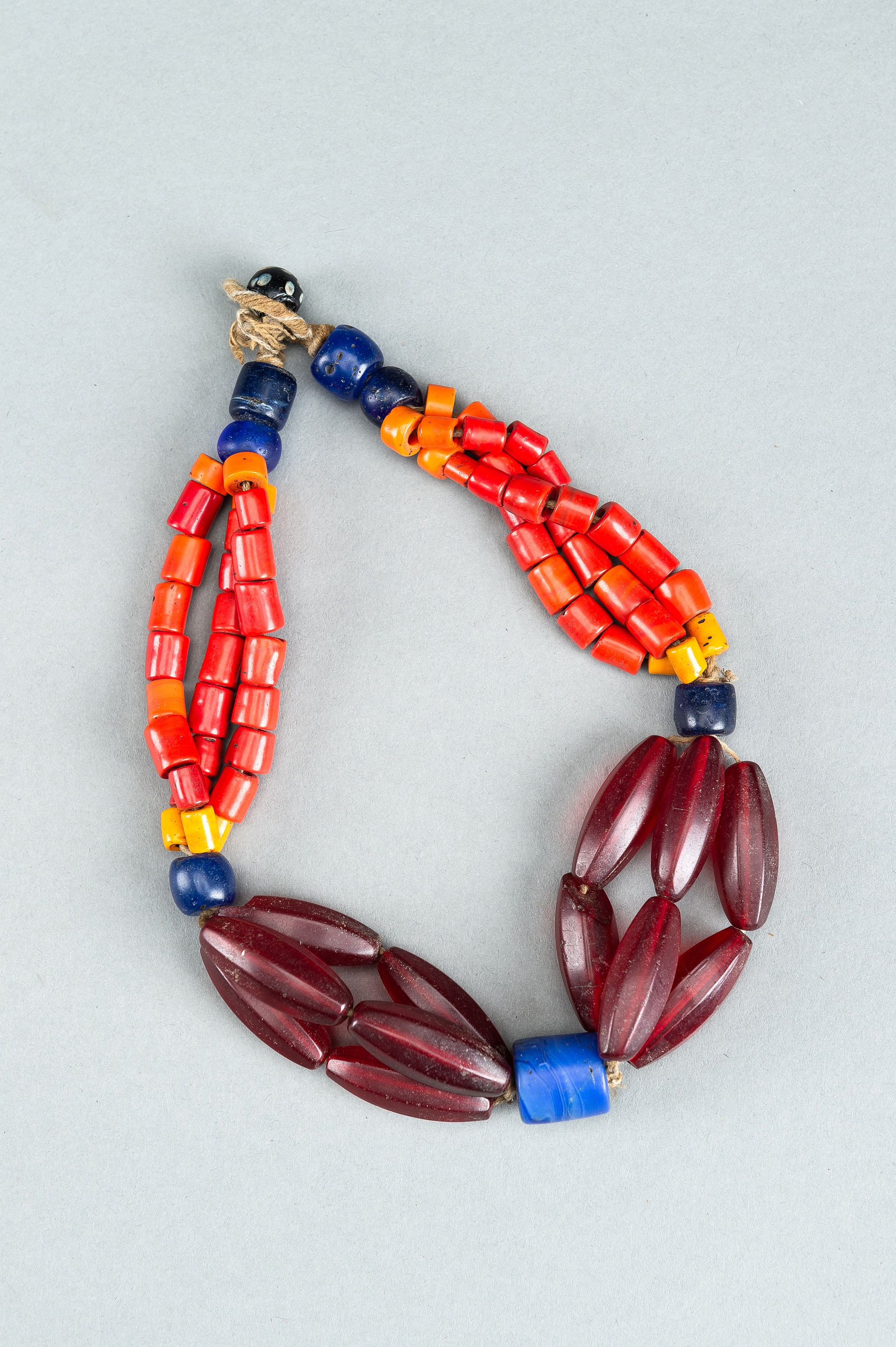 A NAGALAND MULTI-COLORED GLASS NECKLACE, c. 1900s - Image 7 of 9