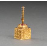 A BURMESE STUPA-SHAPED GOLD BOX INSET WITH RUBIES