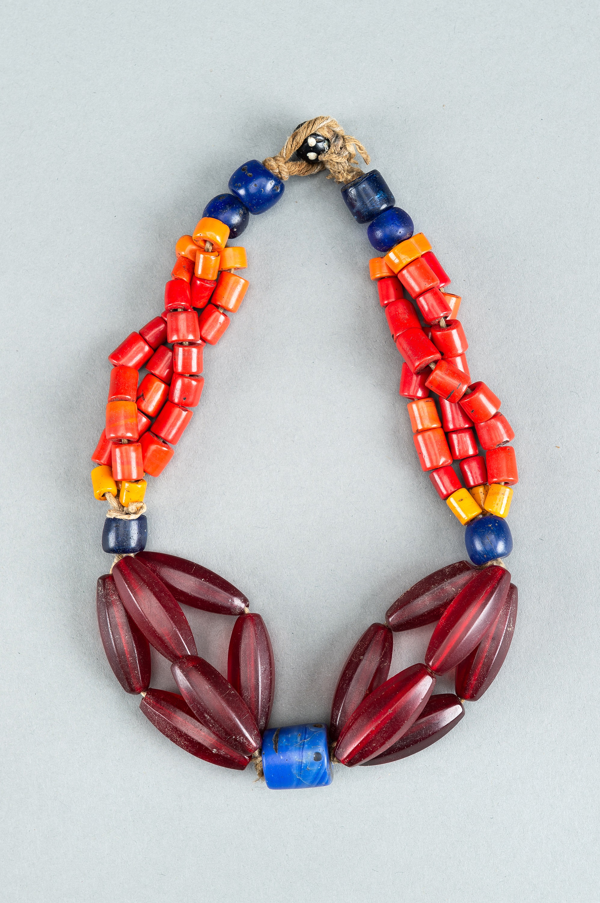 A NAGALAND MULTI-COLORED GLASS NECKLACE, c. 1900s