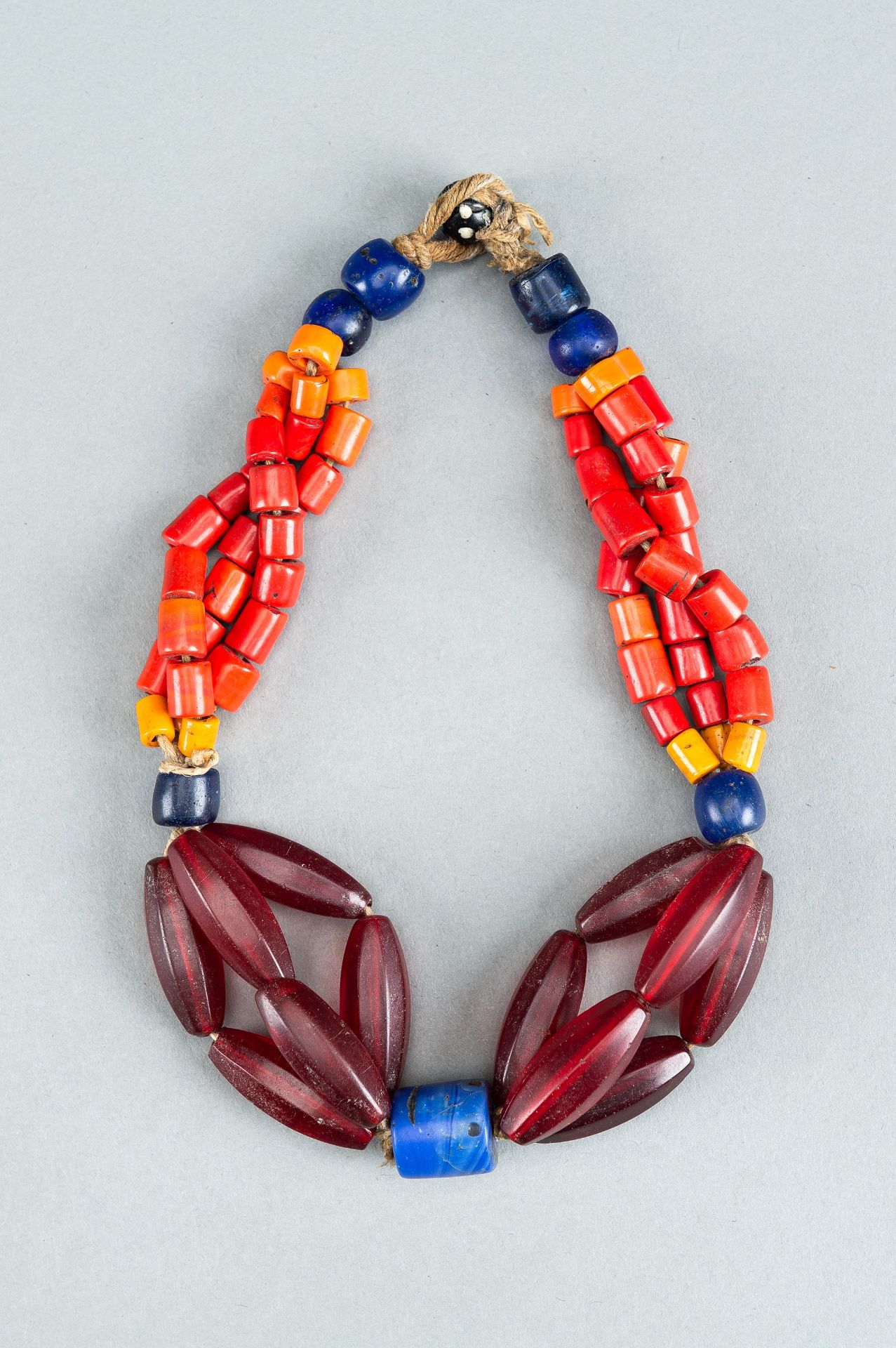 A NAGALAND MULTI-COLORED GLASS NECKLACE, c. 1900s