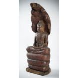 A LARGE WOOD FIGURE OF BUDDHA MUCHALINDA