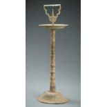 A CHAM BRONZE CANDLE HOLDER