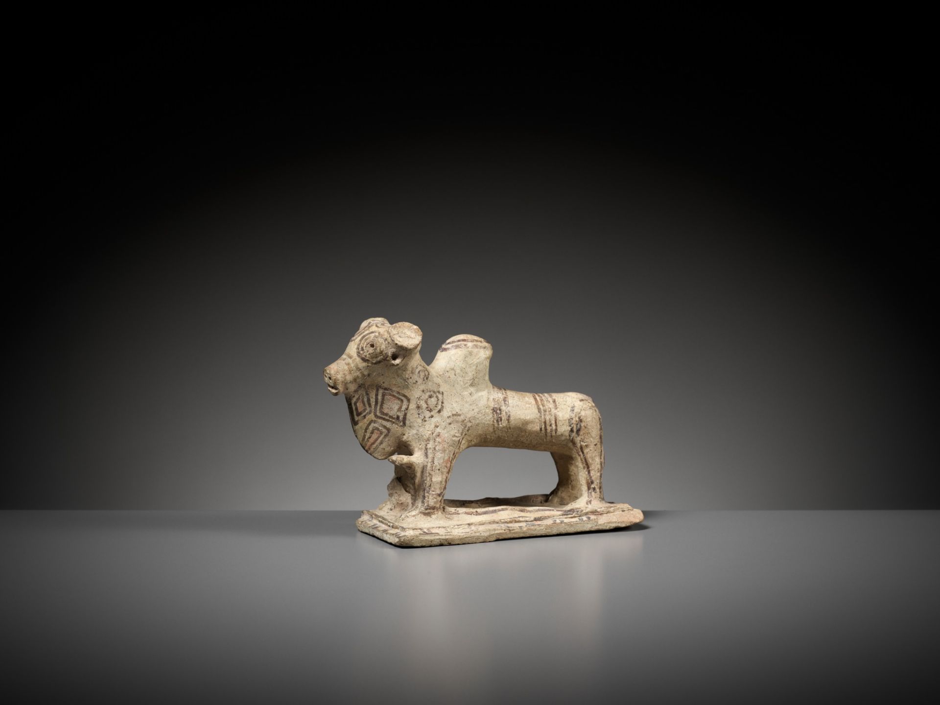 A PAINTED TERRACOTTA FIGURE OF A HUMPED OX, MOHENJO-DARO - Image 7 of 12