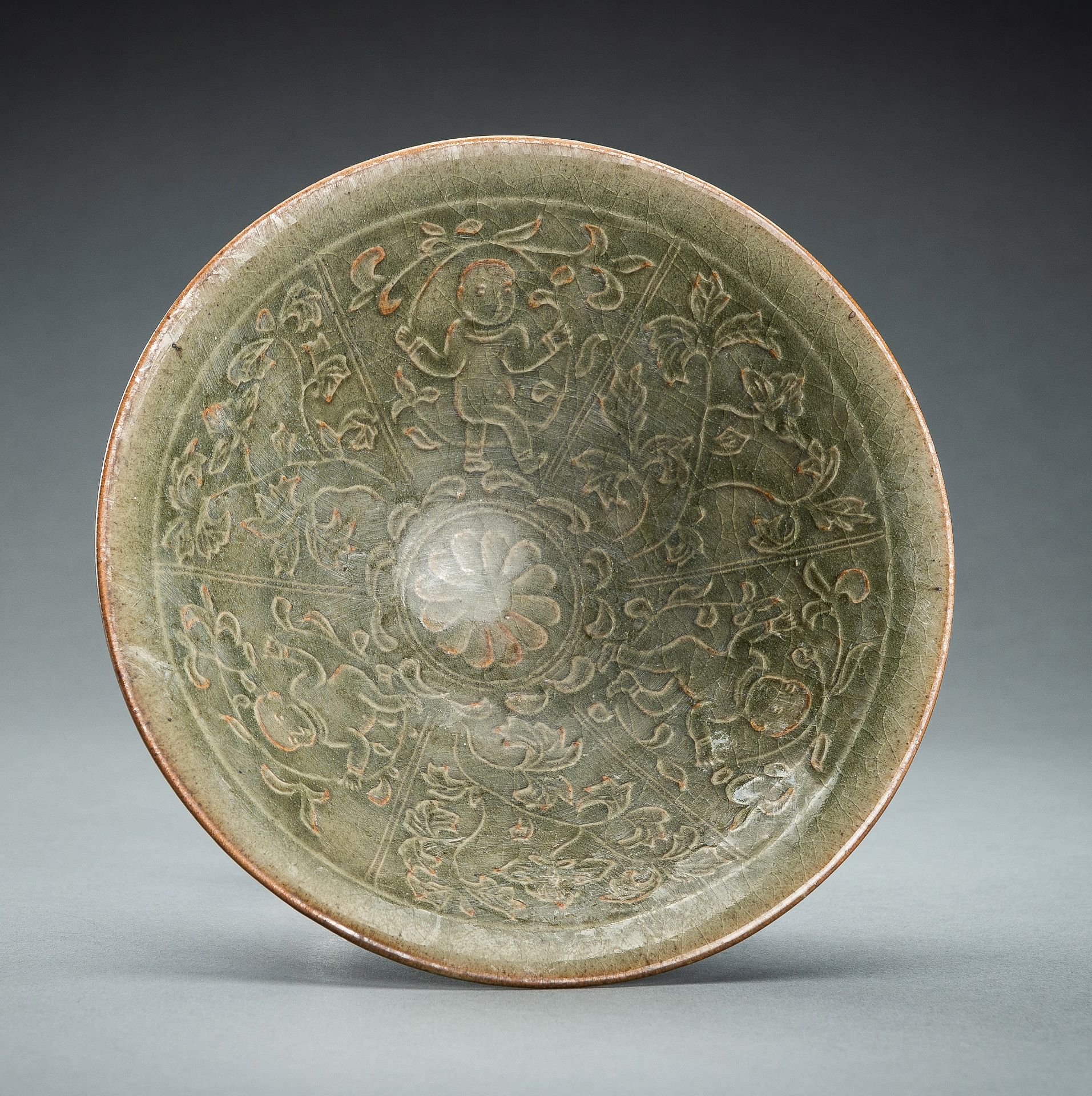 A LONGQUAN CELADON 'BOYS' BOWL, NORTHERN SONG STYLE