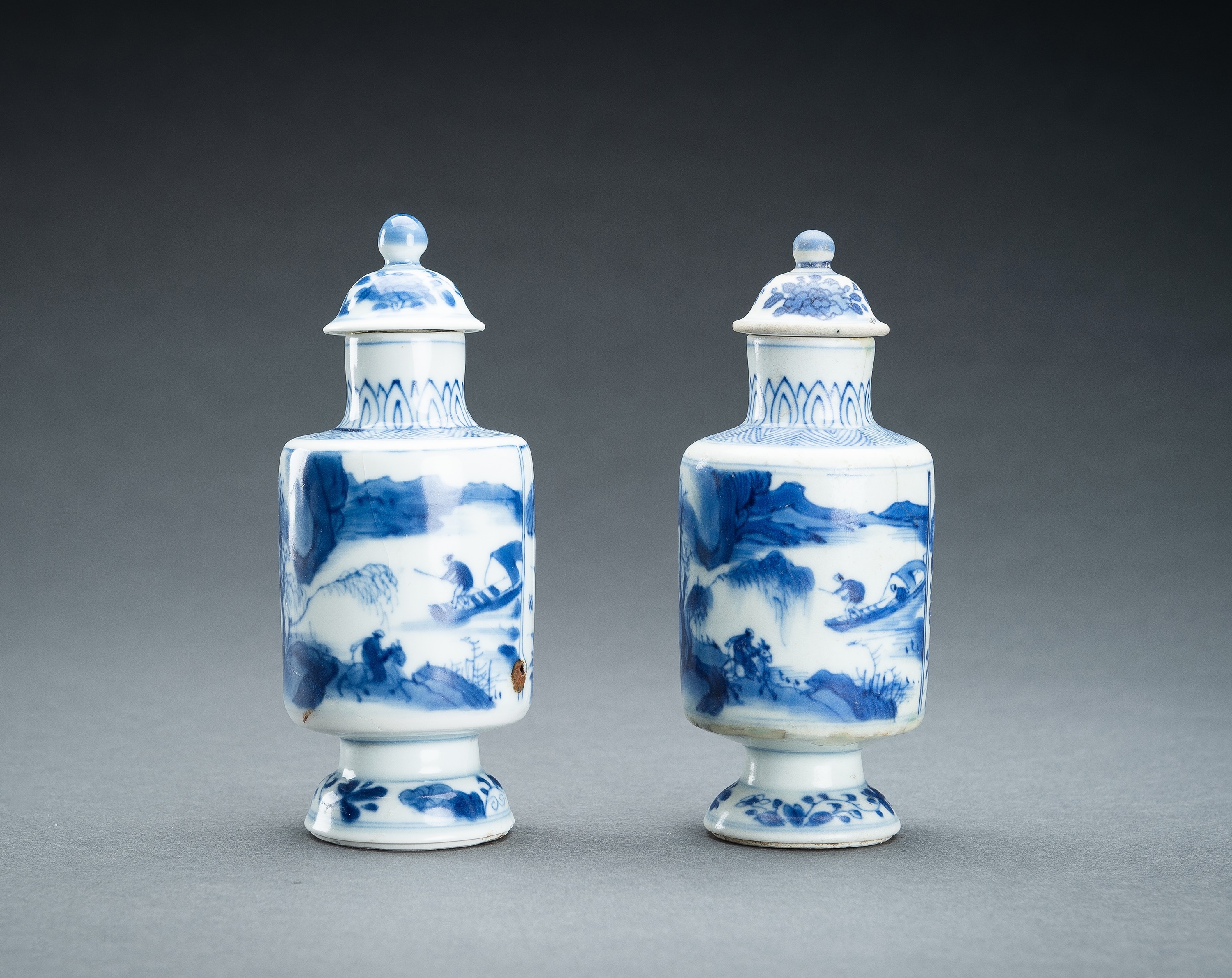 TWO BLUE AND WHITE PORCELAIN VASES WITH COVERS, 17th CENTURY