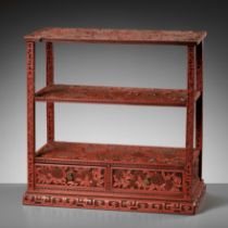 A FINE CINNABAR LACQUER DISPLAY STAND, QING DYNASTY