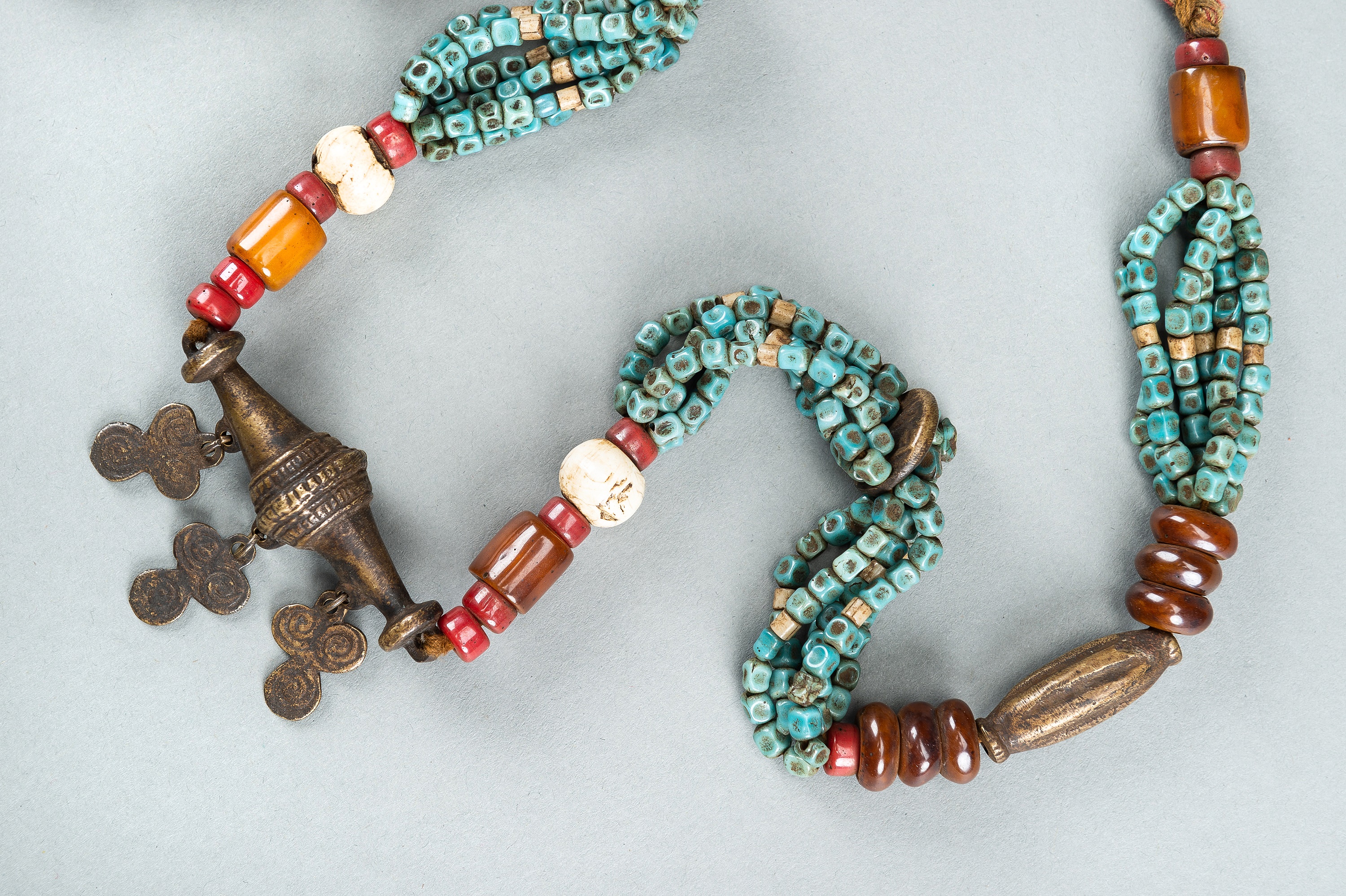 A NAGALAND MULTI-COLORED GLASS, BRASS AND SHELL NECKLACE, c. 1900s