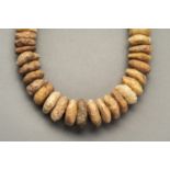 A NECKLACE WITH GRADUATED NEOLITHIC BEADS