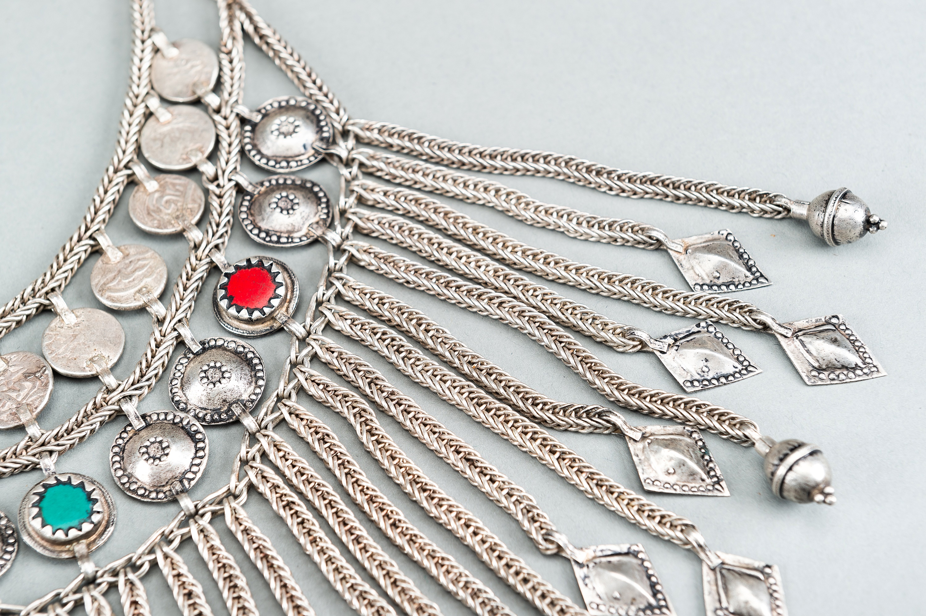 A TRIBAL AFGHAN MULTI-STRAND SILVER NECKLACE WITH GLASS INSETS, c. 1950s - Image 5 of 13