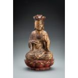 A RED AND GILT-LACQUERED WOOD FIGURE OF A CROWNED BUDDHA