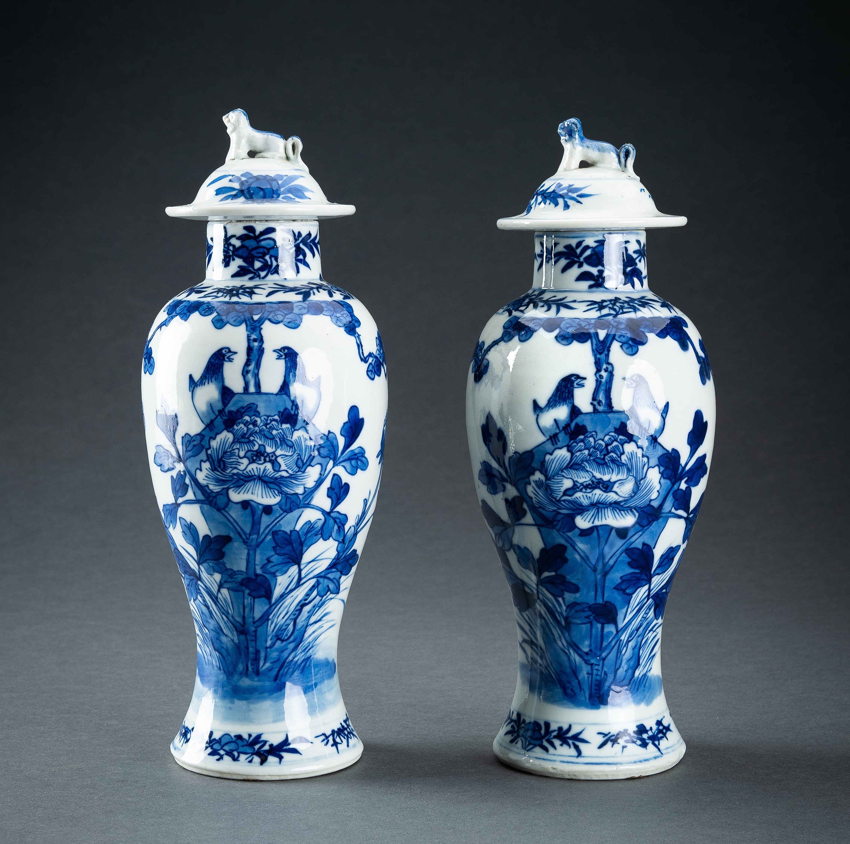 A PAIR OF BLUE AND WHITE BALUSTER VASES AND COVERS, QING