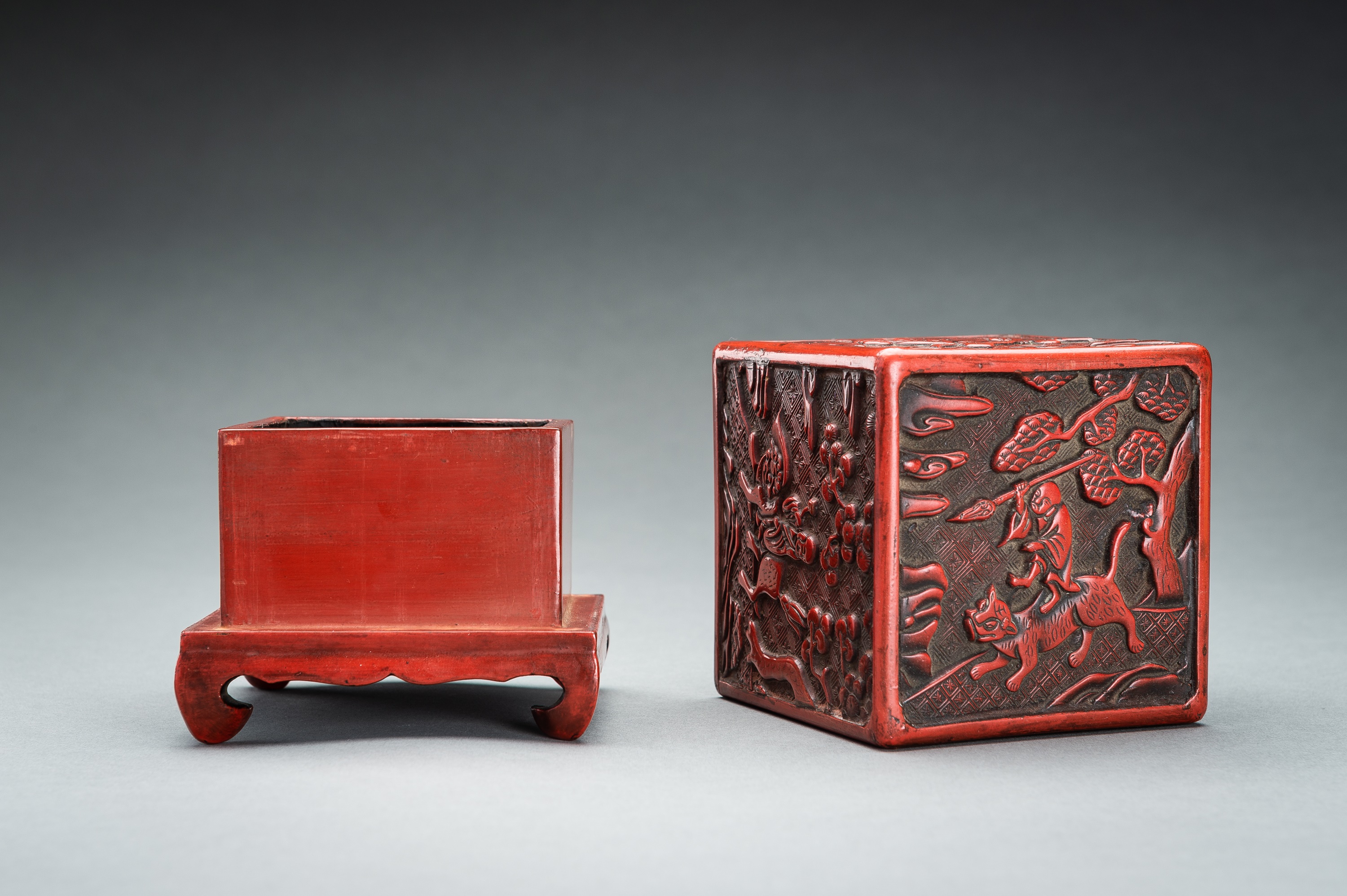 A CINNABAR LACQUER 'IMMORTALS AND BUDAI' BOX AND COVER, QING - Image 11 of 14