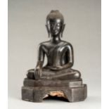 A LAOTIAN BRONZE FIGURE OF BUDDHA SHAKYAMUNI