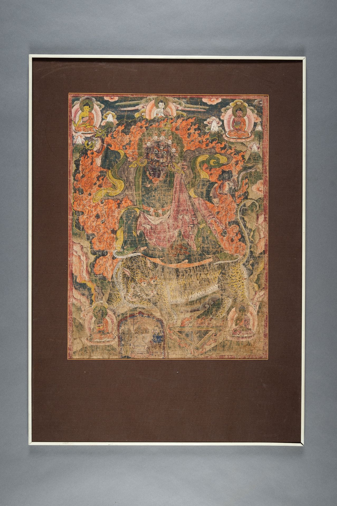 A THANGKA OF MAHAKALA RIDING A TIGER, VYAGHRA-VAHANA