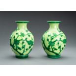 A PAIR OF GREEN OVERLAY PEKING GLASS 'PRUNUS' VASES, GUANGXU MARK AND PERIOD