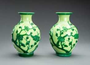 A PAIR OF GREEN OVERLAY PEKING GLASS 'PRUNUS' VASES, GUANGXU MARK AND PERIOD