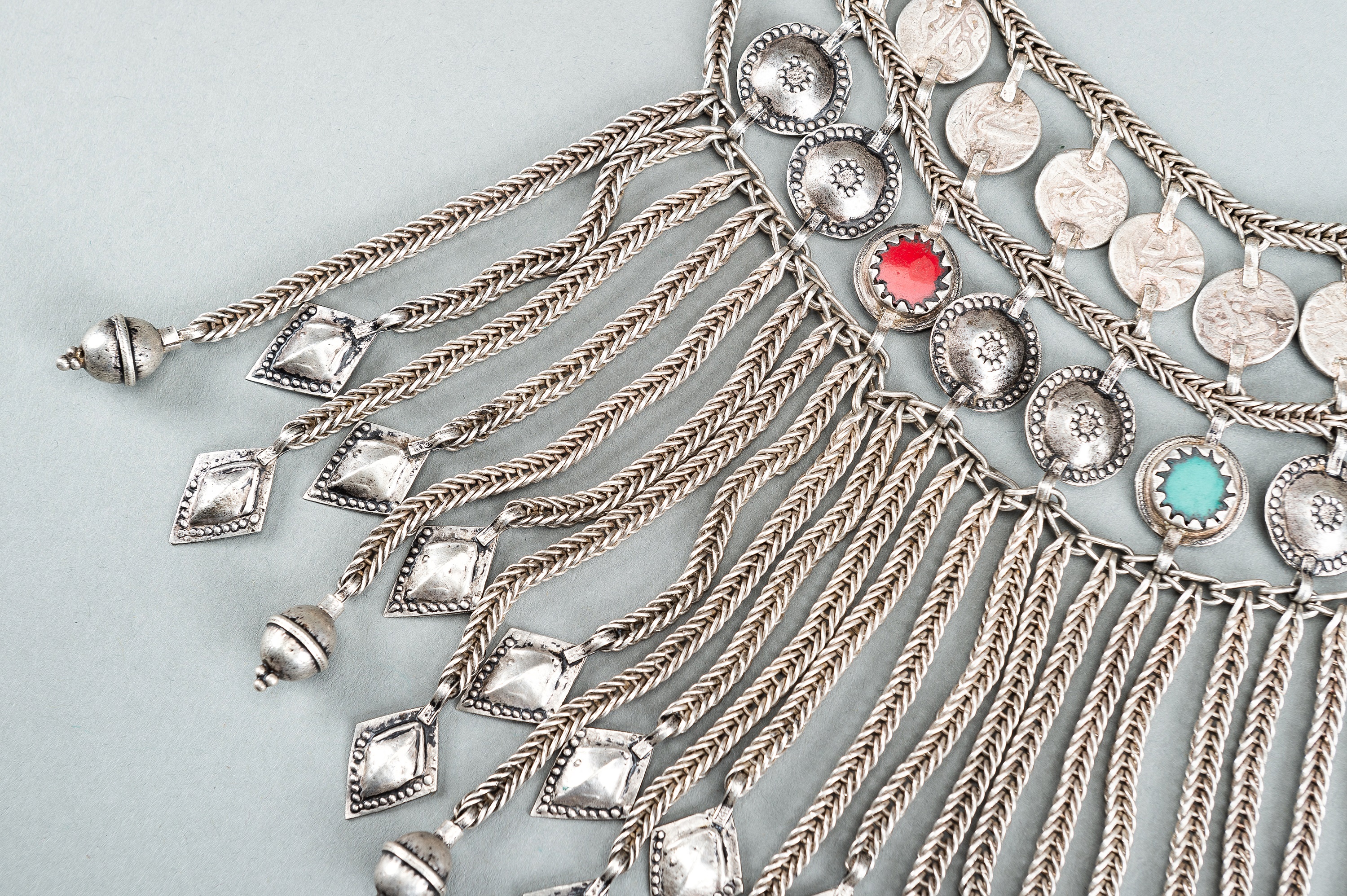 A TRIBAL AFGHAN MULTI-STRAND SILVER NECKLACE WITH GLASS INSETS, c. 1950s - Image 10 of 13