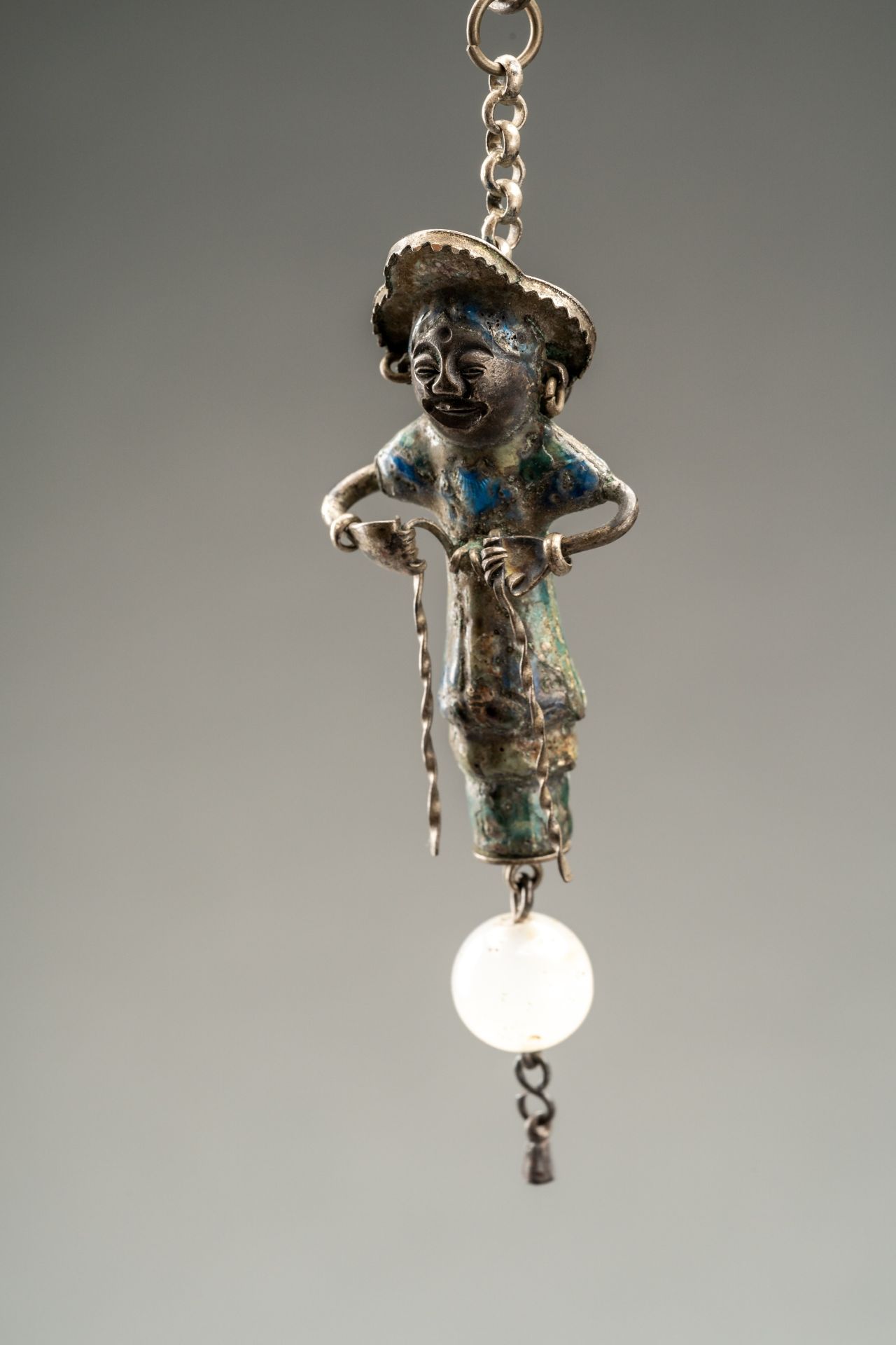 AN ENAMELED SILVER NEEDLE HOLDER, 17th CENTURY