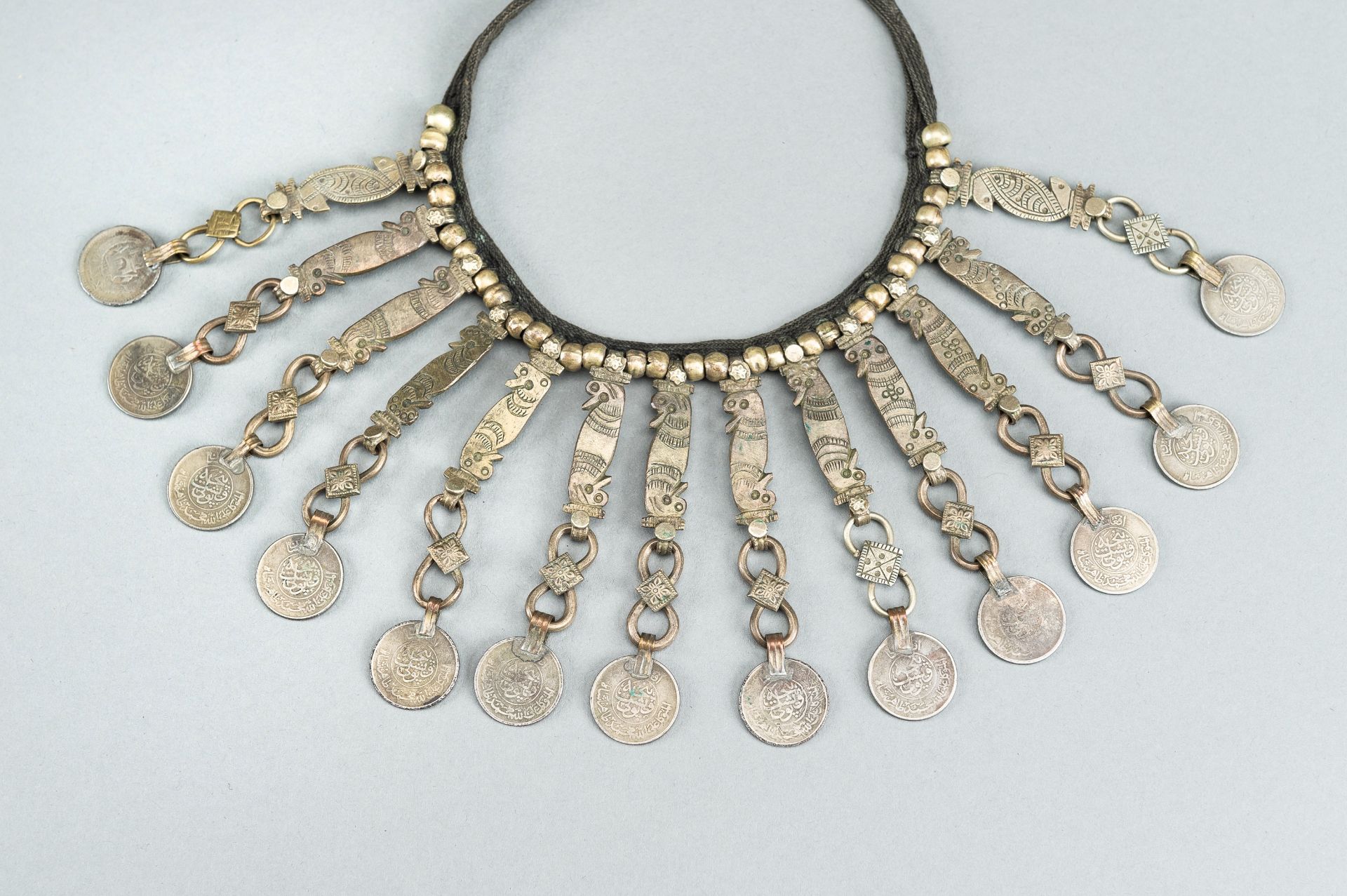 TWO TRIBAL SILVER AND METAL NECKLACES, ONE WITH AFGHAN COINS, c.1950s - Bild 12 aus 12
